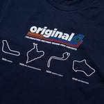 Formula 1 fans: This is a detail shot of a navy t-shirt front with multi color Orginal4 logo and 4 vintage race cars with name and year of each inaugural grand prix race.