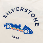 Formula 1 fans: This is a detail shot of a cream colored P1 t-shirt front with blue vintage Grand Prix car and navy Silverstone name plus navy 1948.