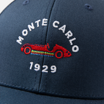 Formula 1 fans: This is a detail shot of a navy baseball cap front embroidered with red vintage Grand Prix car and white Monte Carlo name plus white 1929.