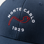 Formula 1 fans: This is a detail shot of a navy baseball cap front embroidered with red Monte Carlo Grand Prix track and white Monte Carlo name plus white 1929.